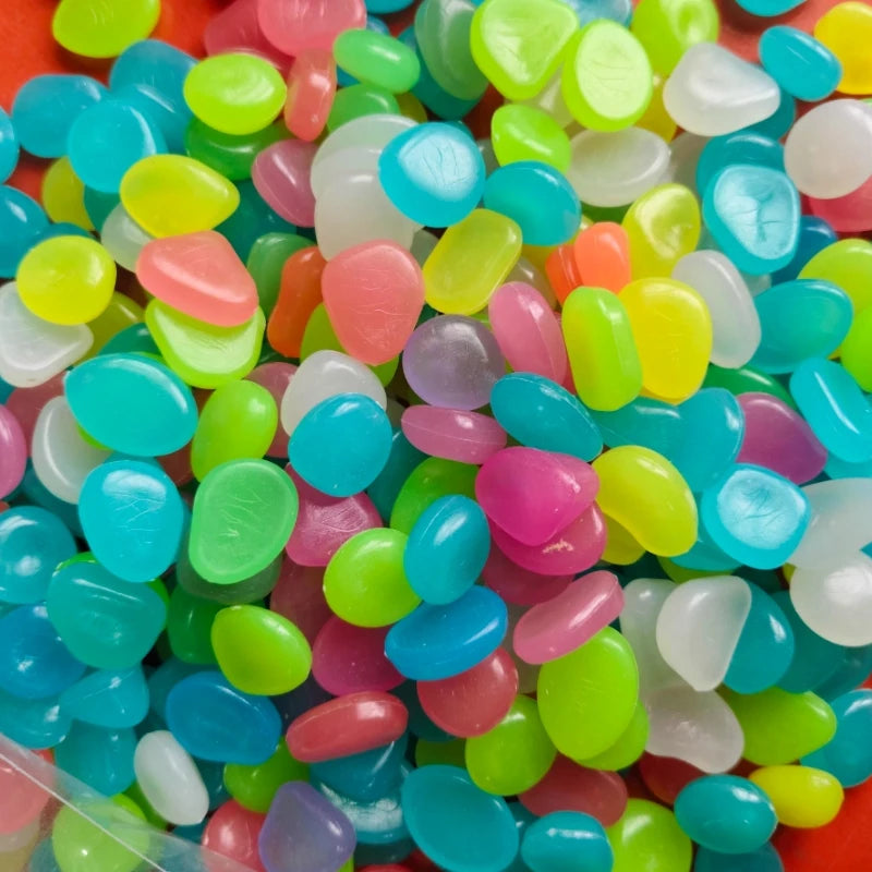 Solar Powered Glow in the Dark 
Pebbles — Blue Luminous Pathway 
Stones for Garden & Landscape Decor