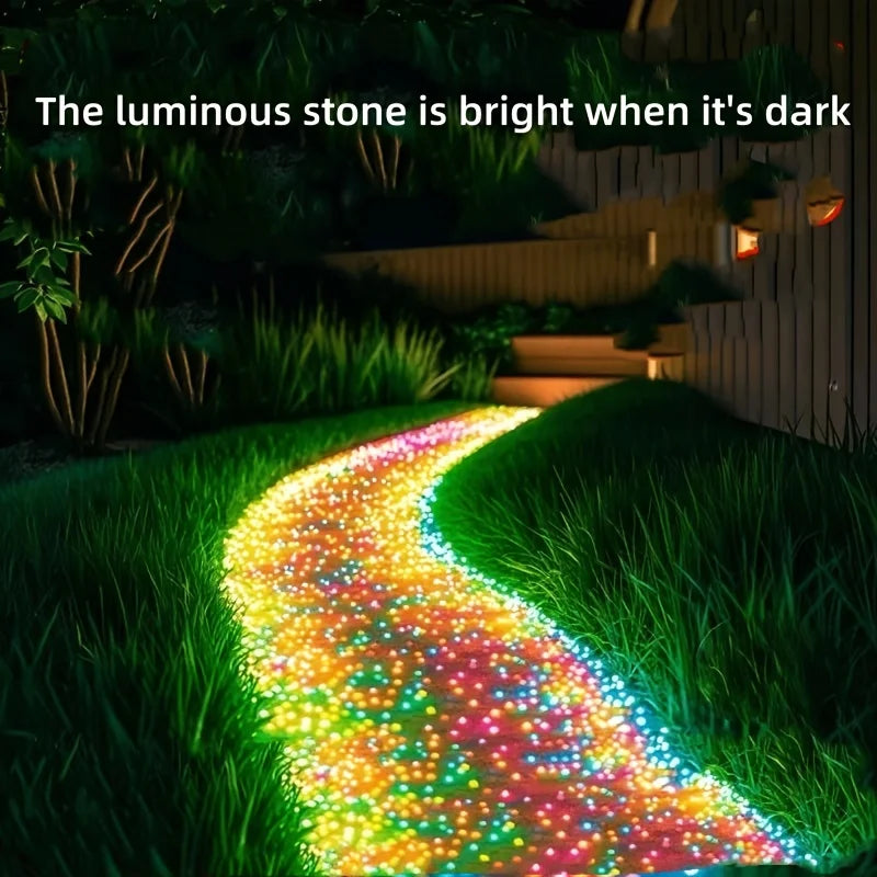 Solar Powered Glow in the Dark 
Pebbles — Blue Luminous Pathway 
Stones for Garden & Landscape Decor